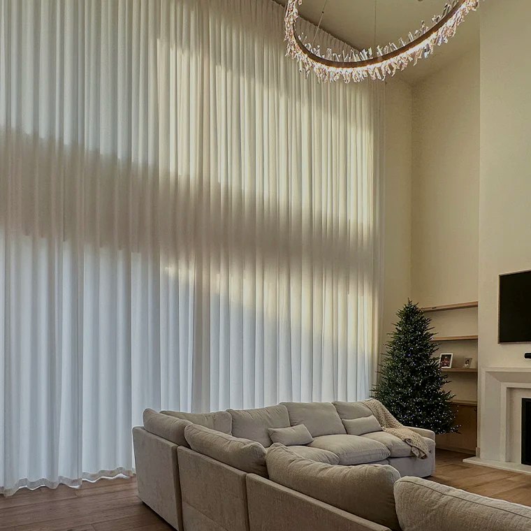 Sheer drapery wall in living room