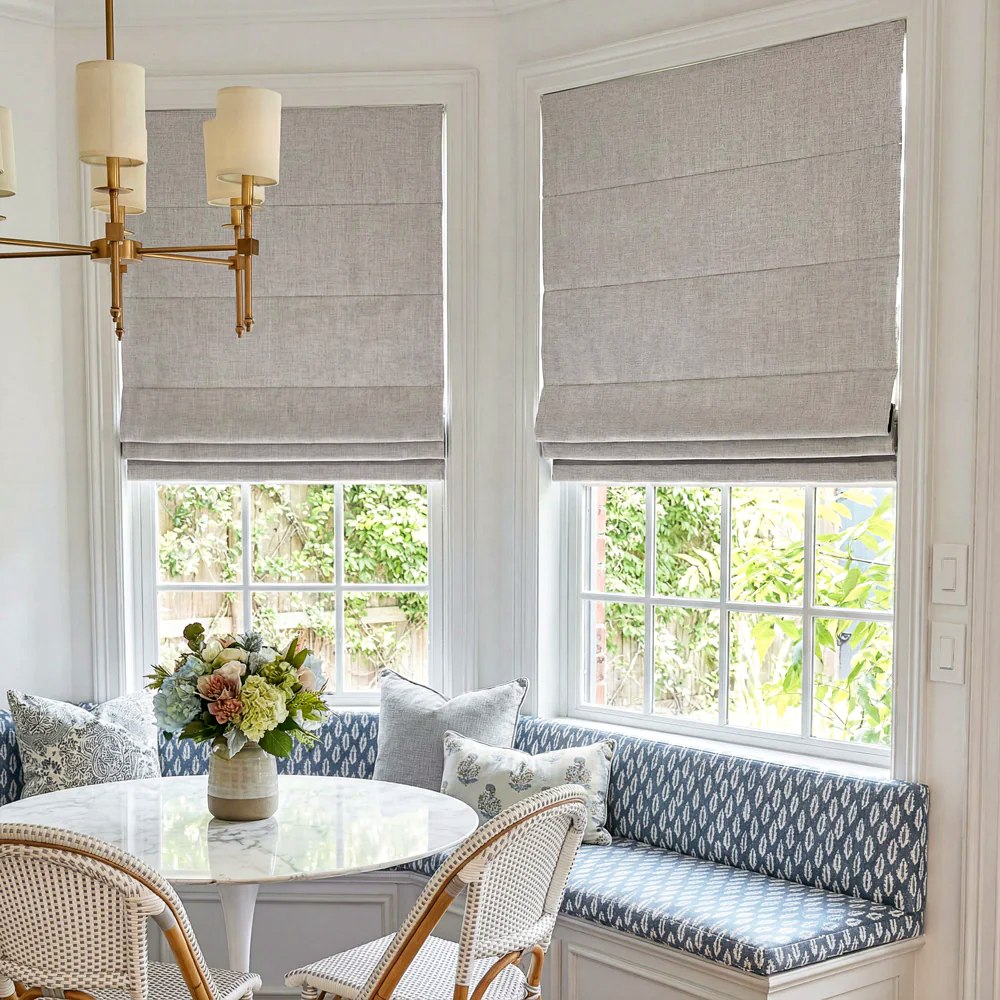 Linen roman shades in dining nook
