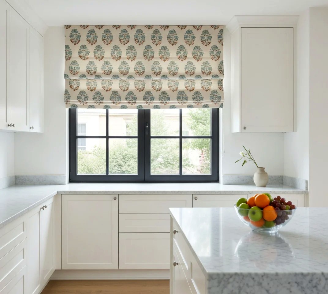 Patterned roman shade in white kitchen